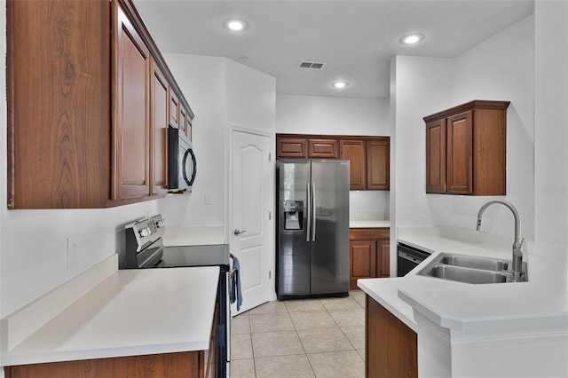 1821 San Jacinto Cir, Sanford, FL 32771 - kitchen with a sink, light countertops, stainless steel appliances, light tile patterned floors, and visible vents