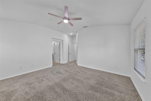 1821 San Jacinto Cir, Sanford, FL 32771 - carpeted spare room featuring baseboards, a ceiling fan, vaulted ceiling, and visible vents