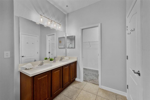 1821 San Jacinto Cir, Sanford, FL 32771 - full bathroom with double vanity, a sink, baseboards, and tile patterned floors