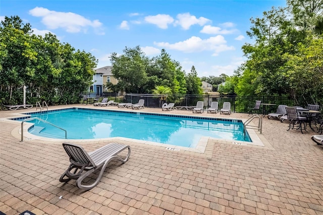 1821 San Jacinto Cir, Sanford, FL 32771 - pool featuring a patio and fence