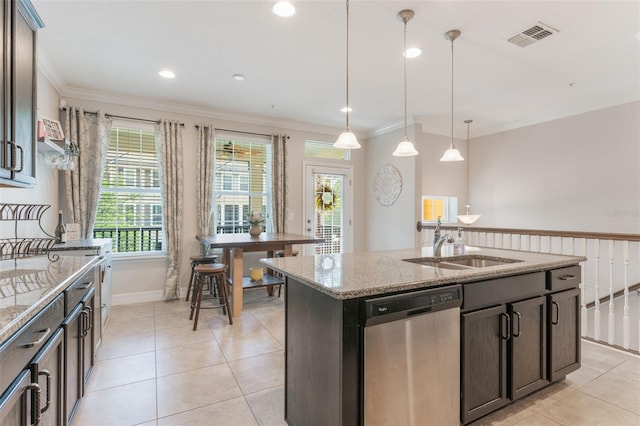 kitchen with light stone counters, a sink, dishwasher, visible vents, and pendant lighting