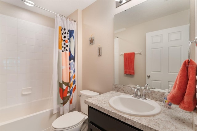 bathroom featuring toilet, shower / bath combo, and vanity
