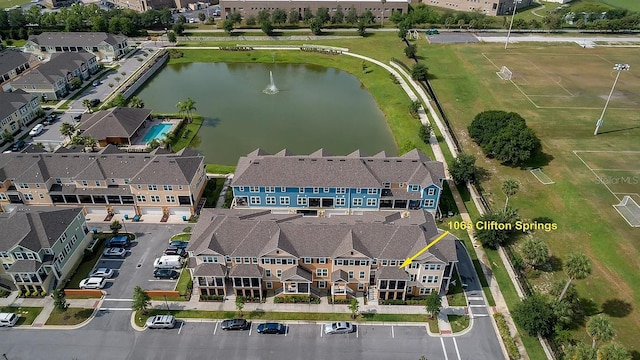 birds eye view of property featuring a water view