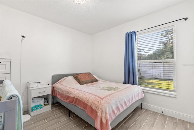 342 Hanging Moss Cir, Lake Mary, FL 32746 - bedroom with wood finish floors and baseboards