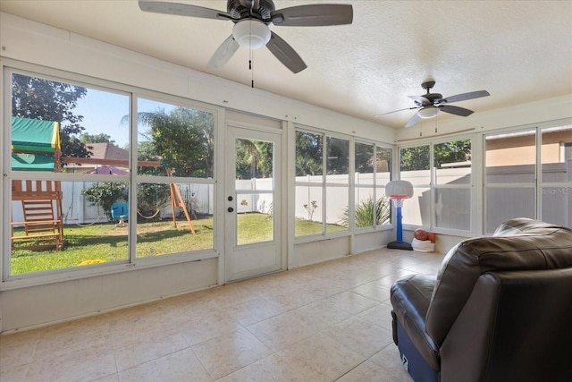 342 Hanging Moss Cir, Lake Mary, FL 32746 - sunroom featuring ceiling fan