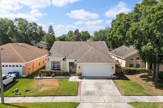 342 Hanging Moss Cir, Lake Mary, FL 32746 - ranch-style home featuring a front yard, stucco siding, driveway, and an attached garage