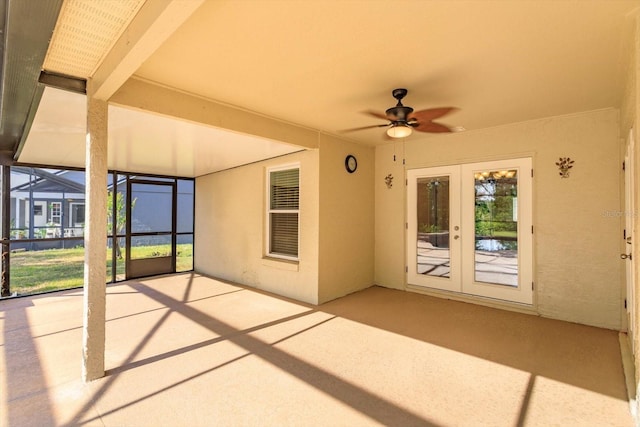 unfurnished sunroom with french doors