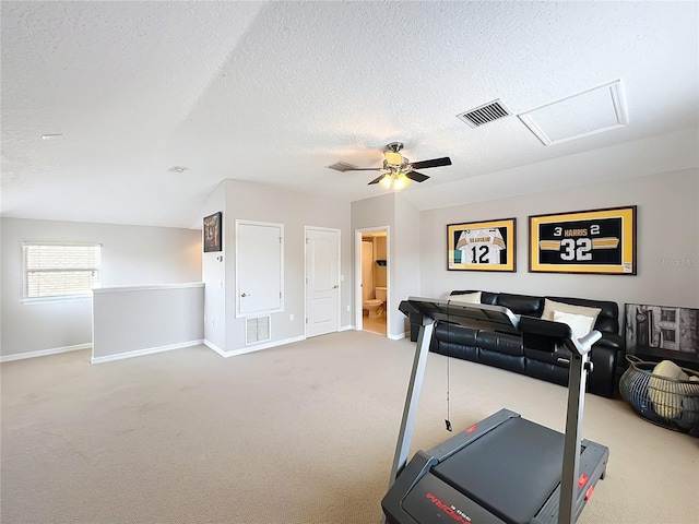 12724 Bideford Ave, Windermere, FL 34786 - exercise area featuring carpet flooring, attic access, a textured ceiling, and ceiling fan