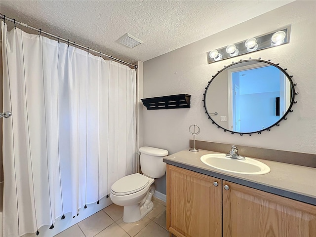 12724 Bideford Ave, Windermere, FL 34786 - bathroom with a textured ceiling, tile patterned flooring, vanity, and curtained shower
