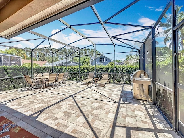 12724 Bideford Ave, Windermere, FL 34786 - view of patio / terrace with grilling area and a lanai