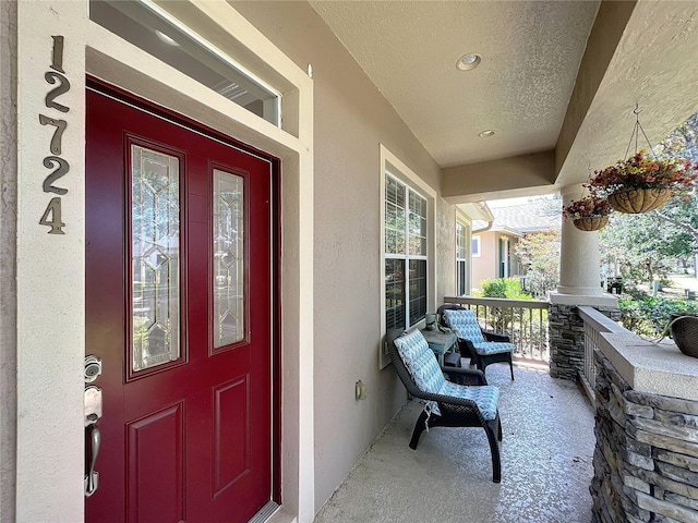 12724 Bideford Ave, Windermere, FL 34786 - property entrance with stucco siding and a porch