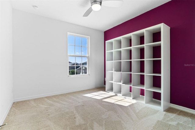 683 Campo Ln, Davenport, FL 33837 - carpeted empty room featuring a ceiling fan and baseboards