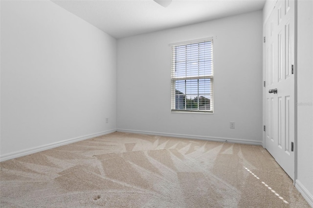 683 Campo Ln, Davenport, FL 33837 - unfurnished bedroom with baseboards and carpet