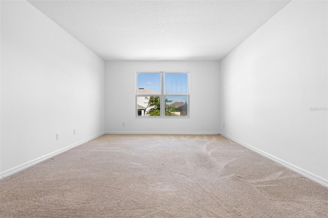 683 Campo Ln, Davenport, FL 33837 - unfurnished room with baseboards and light colored carpet