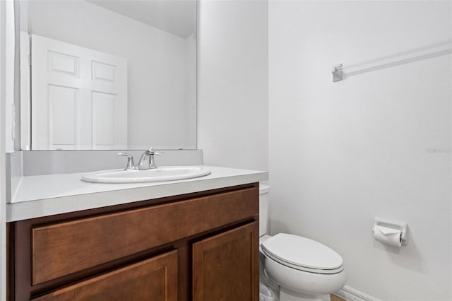 683 Campo Ln, Davenport, FL 33837 - half bathroom with toilet, baseboards, and vanity