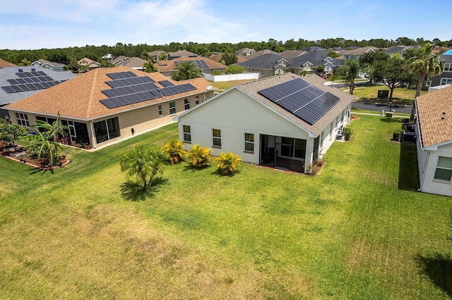 drone / aerial view with a residential view