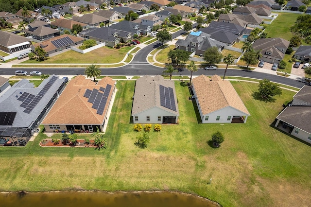 aerial view with a residential view and a water view
