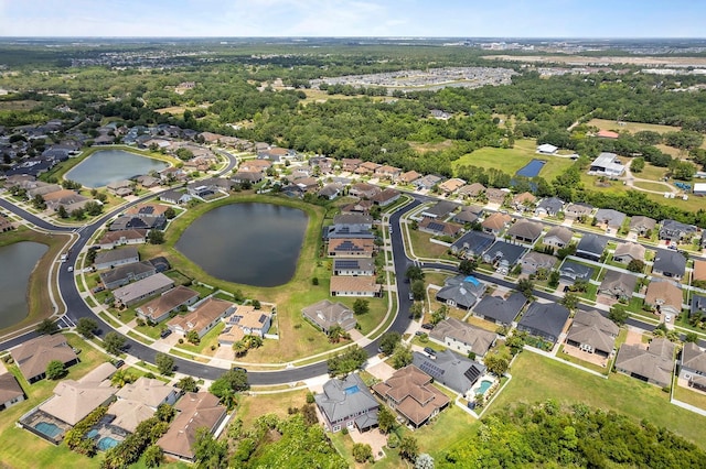 aerial view featuring a water view and a residential view