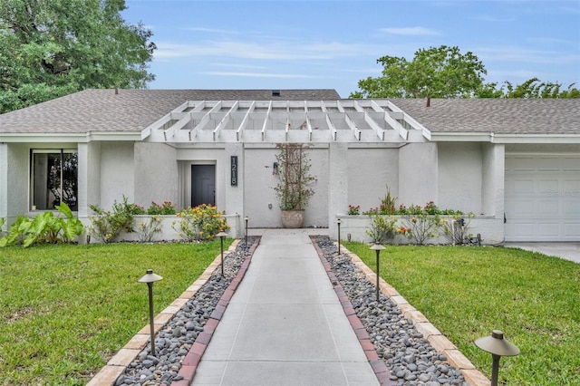 1218 Fairway Dr, Winter Park, FL 32792 - view of front of property featuring stucco siding, a shingled roof, and a front lawn