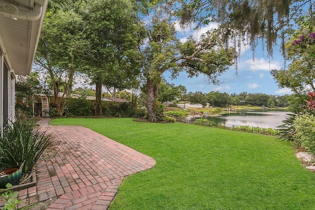 3605 Pershing Ave, Orlando, FL 32812 - view of yard featuring a water view and a patio