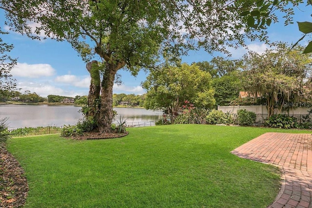 3605 Pershing Ave, Orlando, FL 32812 - view of yard featuring a water view and a patio area