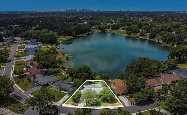 3605 Pershing Ave, Orlando, FL 32812 - aerial perspective of suburban area featuring property parcel outlined and a nearby body of water