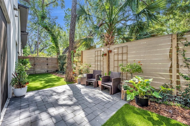 view of patio featuring a fenced backyard