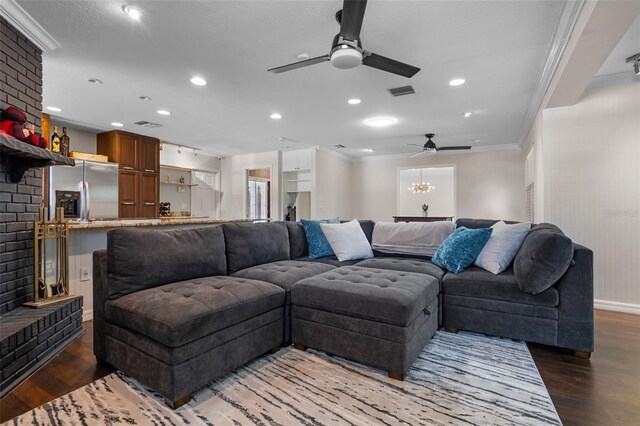 4118 Teriwood Ave, Orlando, FL 32812 - living area with ceiling fan, ornamental molding, recessed lighting, visible vents, and dark wood-style floors