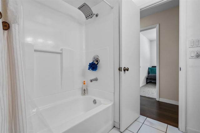 4118 Teriwood Ave, Orlando, FL 32812 - full bathroom featuring tile patterned floors, baseboards, and shower / bath combination with curtain