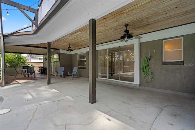 4118 Teriwood Ave, Orlando, FL 32812 - view of patio featuring glass enclosure, a ceiling fan, and outdoor dining area