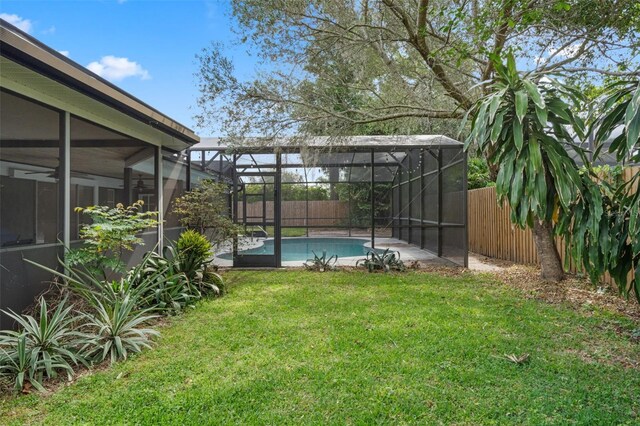 4118 Teriwood Ave, Orlando, FL 32812 - view of yard with a fenced in pool and a fenced backyard