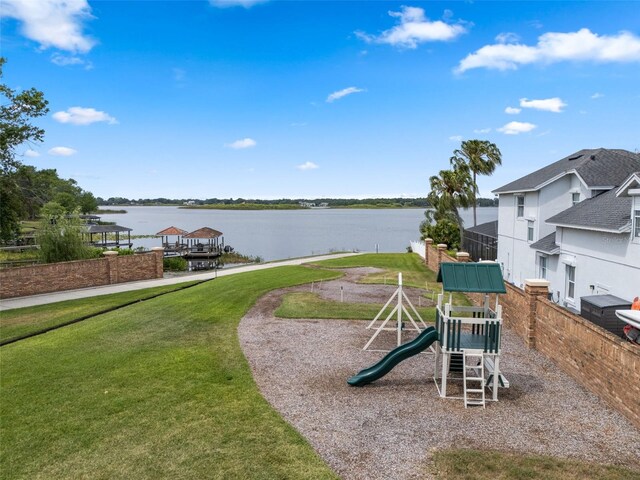 4118 Teriwood Ave, Orlando, FL 32812 - view of jungle gym featuring a lawn and a water view