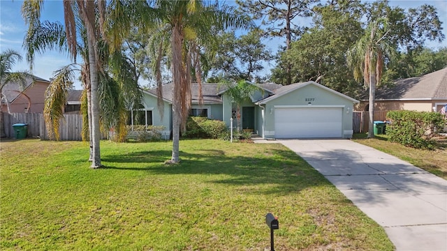 ranch-style house with stucco siding, fence, concrete driveway, and a garage