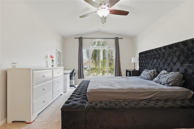 bedroom featuring baseboards, a ceiling fan, vaulted ceiling, and light carpet