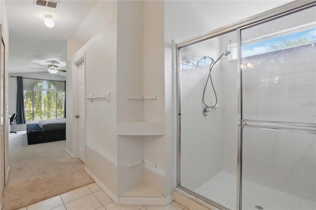 bathroom with ensuite bath, tile patterned floors, a ceiling fan, visible vents, and a stall shower