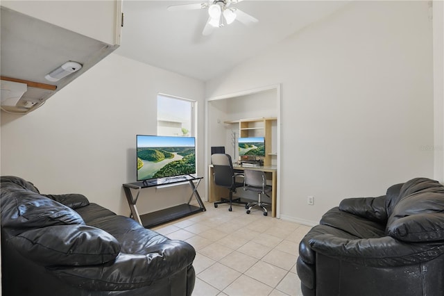 living area with a ceiling fan, lofted ceiling, and light tile patterned floors
