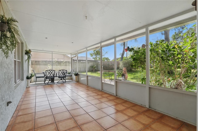 unfurnished sunroom featuring a healthy amount of sunlight
