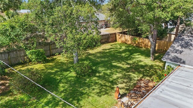 view of yard featuring a fenced backyard