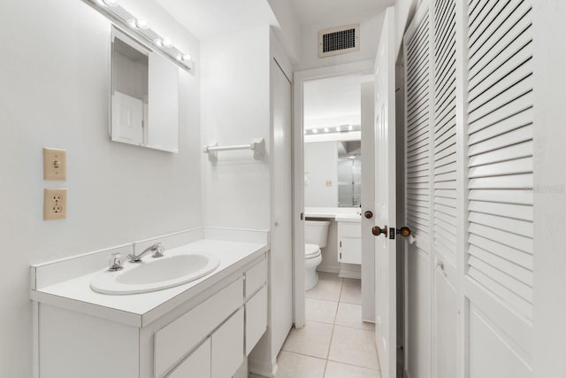 6330 Masters Blvd Unit N4, Orlando, FL 32819 - bathroom with tile patterned flooring and vanity
