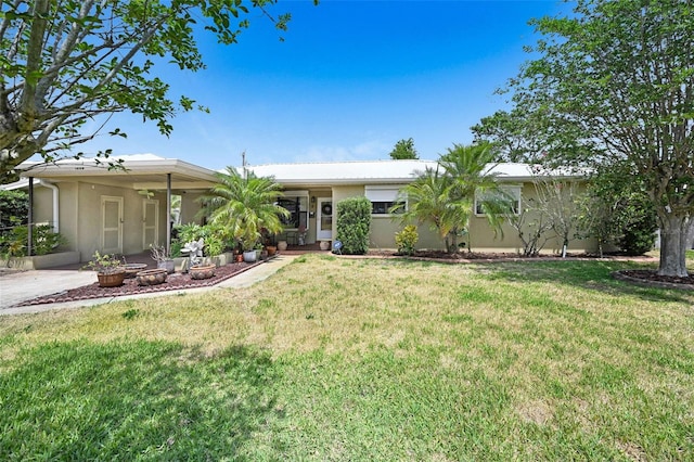 1208 Duke Way, Cocoa, FL 32922 - single story home featuring a front yard, stucco siding, and an attached carport