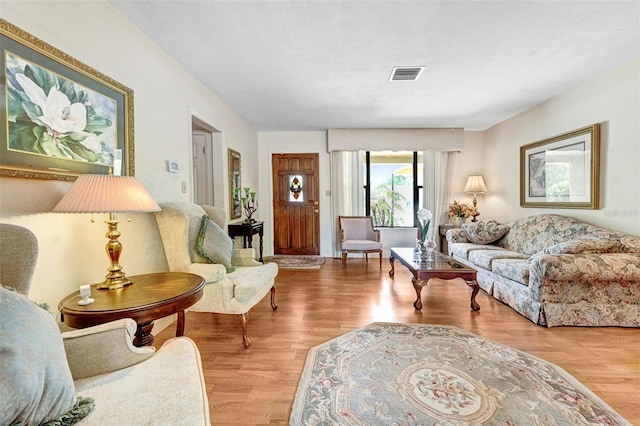 1208 Duke Way, Cocoa, FL 32922 - living room with visible vents and light wood finished floors