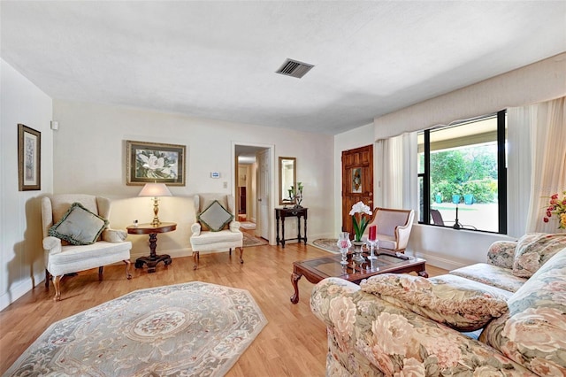 1208 Duke Way, Cocoa, FL 32922 - living room with visible vents, light wood finished floors, and baseboards