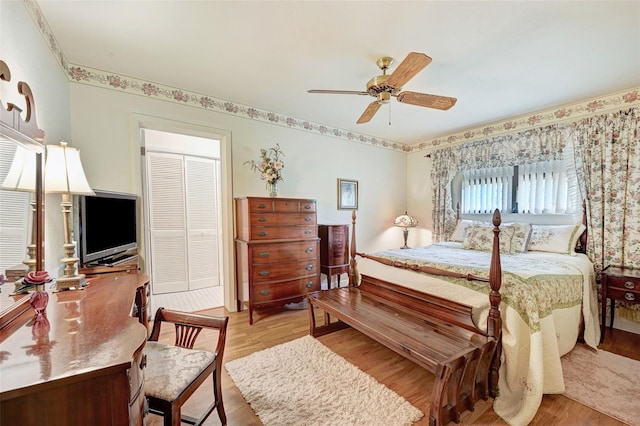 1208 Duke Way, Cocoa, FL 32922 - bedroom with wood finished floors, a ceiling fan, and a closet