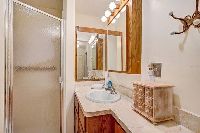 1208 Duke Way, Cocoa, FL 32922 - bathroom featuring baseboards, a stall shower, and vanity