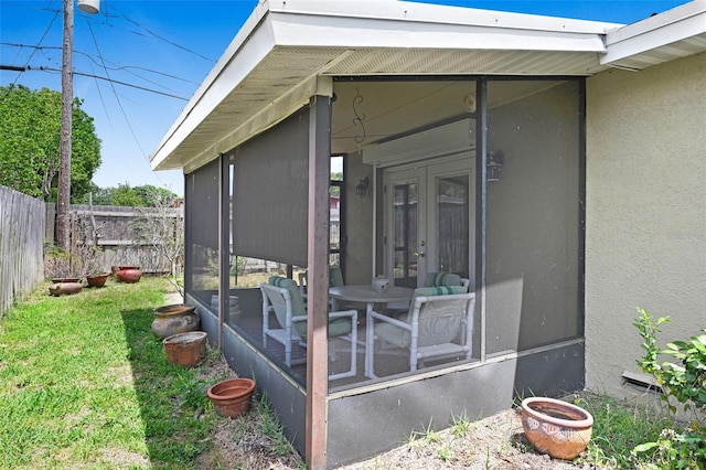 1208 Duke Way, Cocoa, FL 32922 - view of outbuilding featuring a sunroom, french doors, and fence