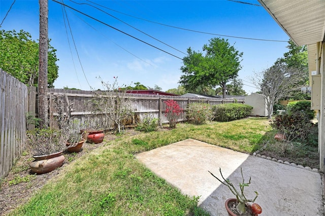 1208 Duke Way, Cocoa, FL 32922 - view of yard with an outdoor structure, a fenced backyard, and a patio area