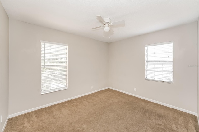 845 N Ludlum Dr, Deltona, FL 32725 - unfurnished room with ceiling fan, carpet floors, and baseboards