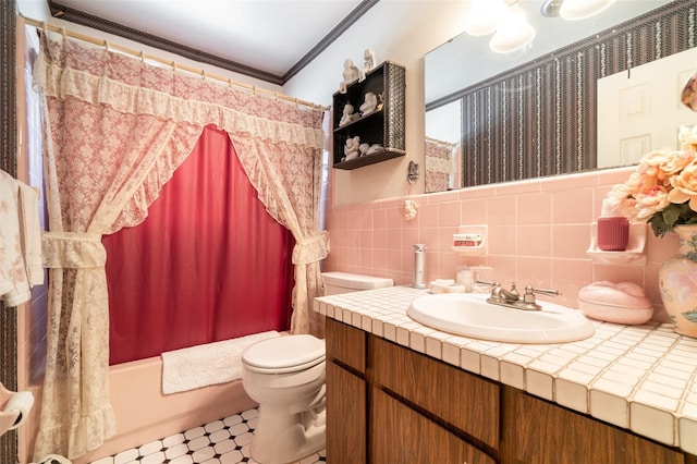 bathroom with crown molding, shower / bath combo, vanity, tile patterned floors, and toilet