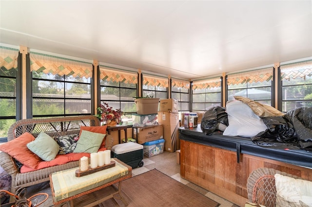 sunroom with carpet floors