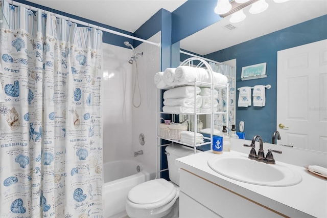 3661 Kingswood Ct, Clermont, FL 34711 - bathroom featuring vanity, shower / bath combo, toilet, and visible vents